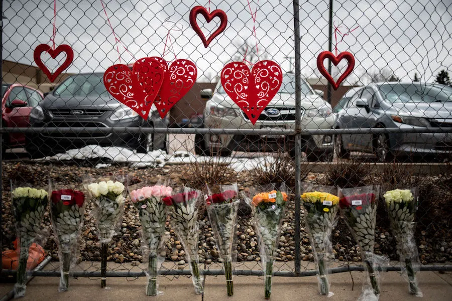 Flowers at a fence outside the King Soopers in Boulder, Colorado where a gunman opened fire on March 23, 2021. ?w=200&h=150